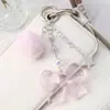 Dulce, Fresco y Versátil Estilo Pareja Bolas de Pelo Multicolor Ojo de Gato Perlas Estrella Acrílico Lazo Llavero Colgante para Bolso