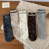 Calcetines de altura media con estampado floral y lazo de burbuja estilo coreano Peiqiao, dulces y femeninos, calcetines sin costuras de algodón puro, venta al por mayor de la industria del calcetín de Zhuji