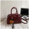 Bolsa de Bowling Retrô Estilo Coreano para Mulheres Outono e Inverno 2025 Nova Moda Bolsa de Ombro de Alto Padrão Bolsa Carteiro Versátil Bolsa Transversal