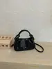 Bolso de mano retro de alta gama transfronterizo bolso pequeño para mujer nuevo a la moda nicho bolso para ir al trabajo versátil bolso de un solo hombro cruzado de moda