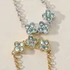 Flor de Primavera Chapado en Plata de Ley 925 Oro de 18 Quilates Zirconia de Cuatro Hojas Azul Hielo Fresco Anillo de Cadena Ajustable Anillo Suave
