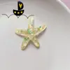 Parches de resina con estrellas de mar y conchas de papel de aluminio de colores para fundas de teléfono DIY, Crocs, imanes de refrigerador y accesorios de ropa al por mayor