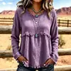 Blusa longa de manga comprida, estilo boho europeu e americano, com franjas, textura e amassada, gola redonda, corte solto e ombros caídos.