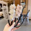 Herramienta para peinar moños perezosos Estilo coreano Simple Versátil Moño de pelo Nueva herramienta para peinar flores para mujeres