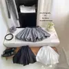 Falda de Cuadros Retro con Botones para Persona Pequeña Falda Media para Mujer Verano 2026 Versátil Anti-Exposición Falda Corta de Corte A Serie Blanco y Negro Esponjosa