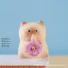 Producto nuevo de fábrica: Juguete giratorio de gato siamés con flor, figura linda de moda, adorno de resina de alta gama, venta al por mayor de artesanías