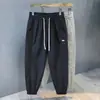 Pantalones Casuales de Malla Transpirables Frescos Impermeables de Marca de Moda de Secado Rápido para Hombres Verano Delgados Sueltos Pantalones Leggings Deportivos para Niños