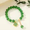 [Venta al por mayor directa de fábrica] Nuevo estilo chino Imitación Jade Dongling Puesto de Exhibición de Feria de Templo del Mercado Nocturno Pulsera de Vidrio Joyería Más Vendido