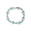 Pulsera abierta de flor de circón, estilo de lujo ligero francés, pulsera exquisita, diseño de nicho, sensación de alta gama, joyería para mujer al por mayor