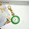 Reloj colgante clásico de moda en color macarrón, reloj de bolsillo simple y colorido, reloj de cuarzo mini portátil para estudiantes