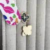 Pendientes de botón de plata S925 de alta calidad, trébol de cuatro hojas azul simple, con diamante, chapados en cobre con oro real, pendientes blanqueadores para mujer