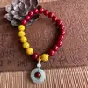 Pulsera de arena dorada púrpura de cinabrio de bajo contenido natural con colgante de paz, producto popular de venta al por menor en línea