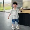 Conjunto Corto de Moda para Niños 2026 Verano Nueva Moda Cuello Redondo Ropa Infantil Versátil Casual Conjunto de Dos Piezas Moderno