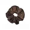 Goma para el pelo de alta gama estilo coreano, de dos colores con estampado de leopardo, para mujer, modelo nuevo 2026, coleta de cuerda para el pelo con un toque de sofisticación