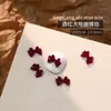 Accesorios Populares para Uñas con Forma de Moño Resina Borgoña Cinta Flujo Mini Pajarita Estéreo Accesorios para Uñas Venta al por Mayor