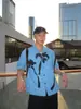 Cita de Verano en la Isla: Camisa Casual Suelta de Manga Corta Azul Estilo Resort Estampada con Cuello Cubano para Hombre