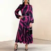 Nuevo vestido casual de manga larga de talla grande, suelto, de estilo europeo y americano, transfronterizo, para mujer, vestido midi estampado elegante y a la moda