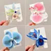 Atmósfera de Primavera Estilo Resort Costero Accesorios de Pasador de Flor de Orquídea Mariposa Simulada 2025 Nueva Diadema para Mujer
