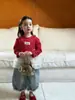 Camiseta Básica Infantil Listrada de Manga Longa com Gola Redonda Soltinha Conjunto de Calça Jeans com Barra de Renda para Meninas Novo Estilo Outono 2026