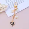Llavero Estilo Tweed Lazo Colgante de Corazón Cadena de Perlas Llavero Colgante para Bolsos y Teléfonos Móviles Manualidades para Niñas