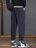 Pantalones deportivos para hombre de marca de moda transfronteriza, estilo otoño e invierno, engrosados y con forro polar, pantalones jogger casuales de corte holgado para hombre