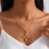 Collar de cruz geométrica de resina vintage europeo y americano, cadena para la clavícula retro de alta gama transfronteriza, joyería personalizada de nicho para mujer