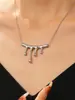 Colar com pingente de cruz de rebite punk hip hop europeu e americano, corrente de clavícula irregular Y2K de alto sentido para mulheres, joias masculinas