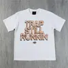 Camisa Holgada Casual con Letras Hip-Hop Mundial Estampado Americano Cuello Redondo Manga Corta Top Syna para Hombre y Mujer Pareja Europeo y Americano