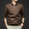 Camiseta de manga larga para hombre, nueva sudadera de otoño e invierno con cuello alto y media cremallera, moderna y versátil, sudadera gruesa de retazos para hombre