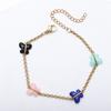 Pulsera de acero de titanio con mariposa y clip de cadena O transfronteriza, chapada en oro de 18 quilates al vacío, acero inoxidable, retención de color, buena moda.