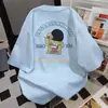 Camiseta Redonda Informal Retro para Mujer Verano 2025 Top de Longitud Media Holgado con Estampado de Letras de Dibujos Animados Mangas Cortas Versátiles