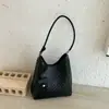 Bolsa de Ombro Feminina Nova de Verão 2026 Estilo Coreano Textura Trançada Bolsa de Axila Fashion Chic Casual Chic Grande Capacidade