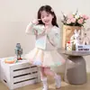 Conjunto de Suéter para Niña 2026 Otoño/Invierno Nuevo Estilo Color Arcoíris Degradado Cuello Solapa Cárdigan de Punto Falda con Volantes Conjunto de Dos Piezas