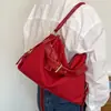 Bolsa de hombro casual de correa ancha, nuevo estilo para principios de otoño de 2026, bolsa cruzada versátil, bolsa tote de gran capacidad para el antebrazo para mujer