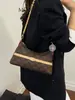 Bolsa de Axila com Monograma em Forma de Meia-Lua para Mulheres 2026 Nova Bolsa de Corrente Francesa com Acabamento de Luxo, Bolsa de Ombro Único Transversal, Estilo de Luxo Leve