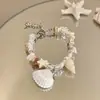 Pulseira Pingente Estrela do Mar Pérola Cristal Concha Estilo de Férias Nicho Versátil Pulseira Moda Pulseira de Temperamento de Alto Padrão