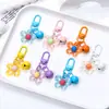 Chaveiro Pingente Flor Colorida Oca Sino de Metal Ornamento Pendurado Artesanal DIY Acessórios para Chaveiro Venda por Atacado