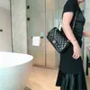 Bolsa de corrente acolchoada de couro genuíno de alta qualidade, inspirada na Chanel, para mulheres, nova coleção 2026, bolsa de ombro da moda em pele de carneiro com fecho de cadeado.