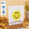 Sacolas personalizadas descartáveis para viagem para produtos de panificação transfronteiriços, apresentando fundo pontudo, revestimento resistente a óleo e material de papel kraft