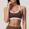 Ropa deportiva de yoga transfronteriza con cuello halter, top sin mangas, sujetador deportivo sexy europeo y americano, top de tirantes con bloques de color para Pilates