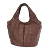 Bolso de mano nuevo con estampado de leopardo transfronterizo otoño/invierno 2026, un bolso tote de nicho y versátil para mujer, perfecto para ir al trabajo y llevar loncheras