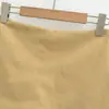 Ropa de mujer transfronteriza al por mayor nuevo gamuza francesa otoño e invierno cintura media ajustada a la cadera falda corta falda de traje profesional pantalones cortos
