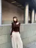 2026 Novo Conjunto Americano Irregular Outono/Inverno: Blusa Interna Gola Alta Slim Fit Vazada + Calça de Moletom