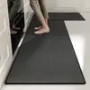 Tapete para piso específico para cocina, simple y práctico para uso doméstico, absorbe agua y aceite, es resistente a la suciedad, antideslizante, lavable, tapete de piso largo de tierra de diatomeas