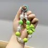 Nova corrente de celular com laço de miçangas inspirada na dopamina, um acessório fofo e estiloso para bolsas, e um chaveiro de carro doce e legal para meninas