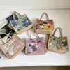 Bolsa de ombro com textura simples, design de nicho, nova moda de verão 2026, bolsa tote feminina casual e estilosa