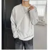 Camiseta de manga larga con cuello redondo, de doble capa, con diseño de dos piezas falsas, de media botonadura, para hombre, casual, versátil, holgada, para primavera y otoño, con un diseño elegante