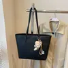 Bolsa grande com padrão de lichia para mulheres, nova coleção 2026, leve e luxuosa, adequada para o dia a dia, bolsa tote moderna, bolsa de ombro e bolsa de axila