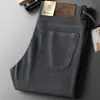 Calça casual de sarja leve de cinco bolsos para primavera e verão masculina reta business solta respirável macia versátil elástica