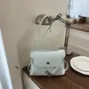 Bolso de axila de nicho estilo coreano para mujer 2026 Verano Nuevo Bolso de hombro simple para el trabajo Bolso de axila Bolso cruzado de moda